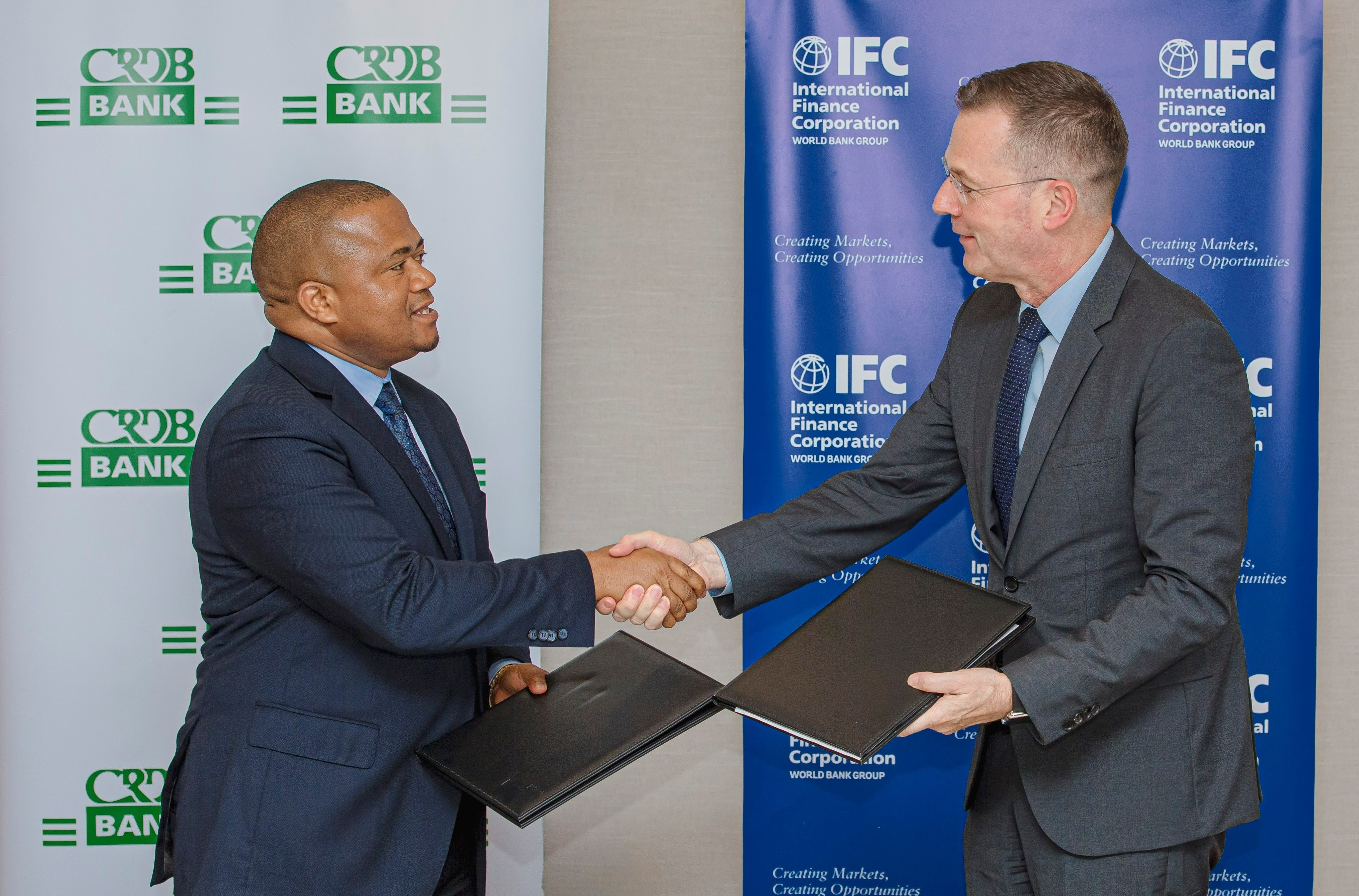 IFC CRDB Standing Handshake_12 July 2022.jpg